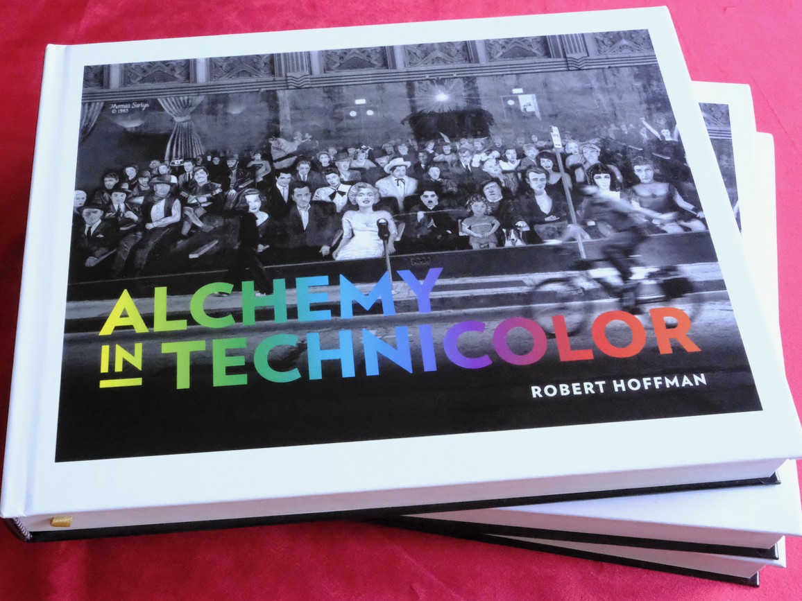 Two copies of the Alchemy in Technicolor hardcover, photographed by Robert Hoffman